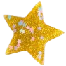 A glittery yellow star-shaped magnet with smaller, lighter-colored holographic stars embedded inside.